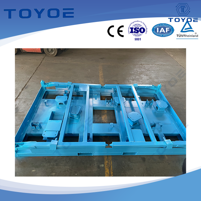 Racks métalliques bleus empilables et pliables à usage d'usine.