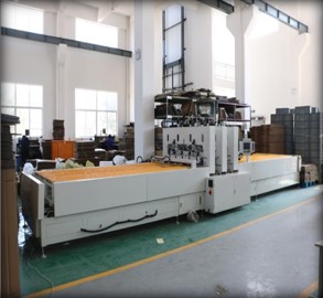 Ligne de traitement de caisses-palettes 